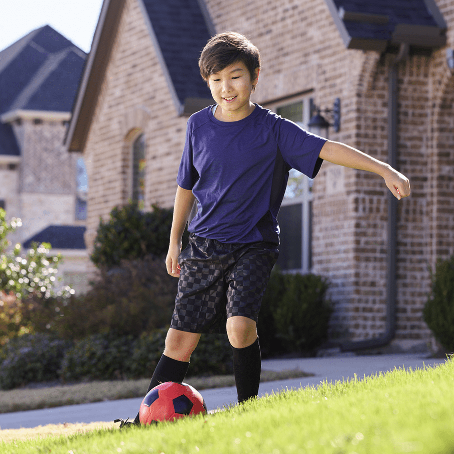 Boy playing soccer
